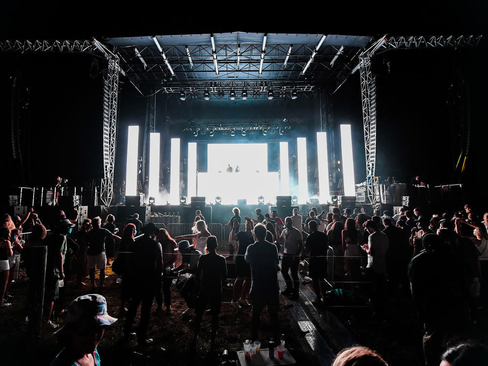 Authorities in New York are investigating after video emerged showing an sizable audience dancing close together at charity concert on Saturday in Southampton, N.Y..