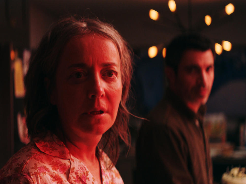 Jane (Jane Adams) and Jason (Chris Messina) get caught up in a viral outbreak of fatalism in <em>She Dies Tomorrow</em>.