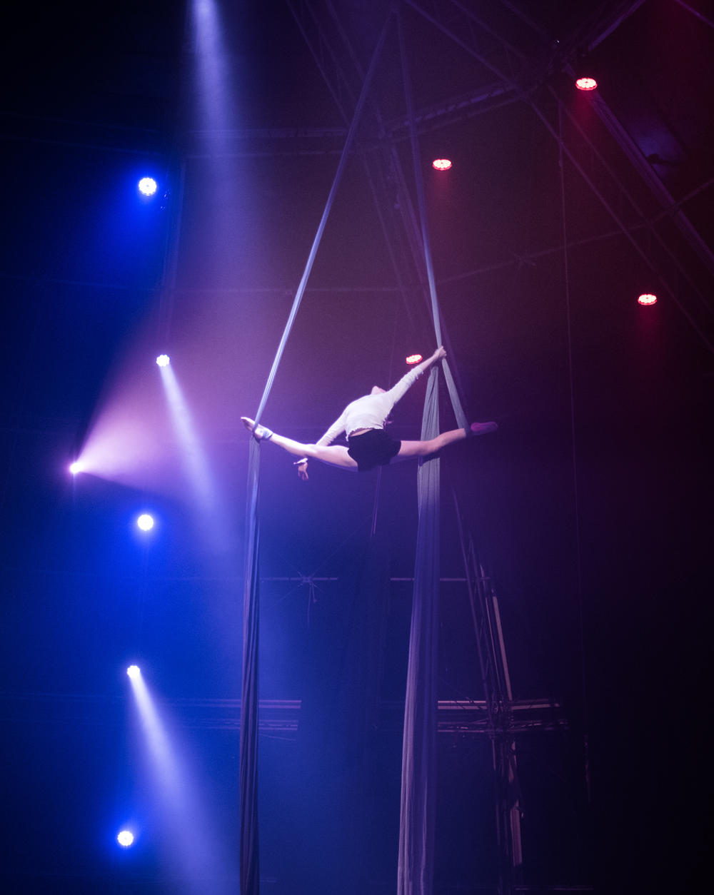 Sabine Van Rensburg, the daughter of Zip Zap's founder, Brent Van Rensburg, performs aerial silk acrobatics act during a show in Cape Town, South Africa. She now tours with the Canada-based Seven Fingers circus but returned as a visiting performer.