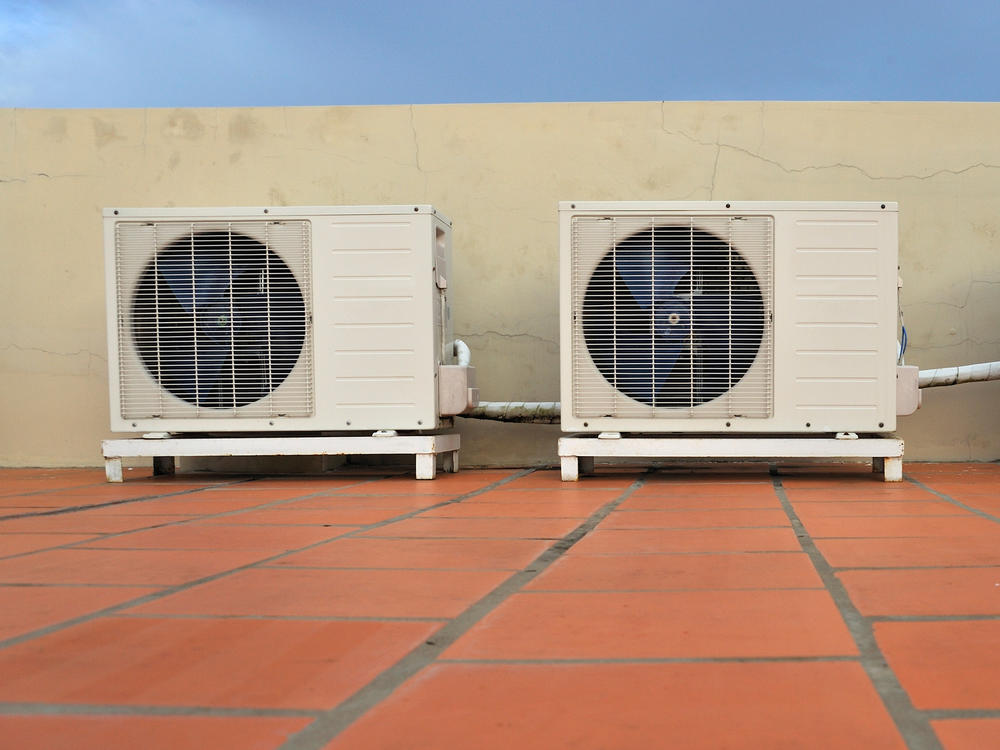 Air conditioners on a building. Scientists say there has been too little research into the role of heating, ventilation and air conditioning systems in the spread of the coronavirus.