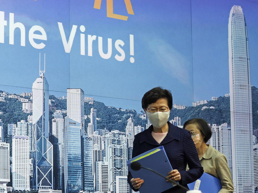 Hong Kong Chief Executive Carrie Lam, shown here arriving for a news conference in Hong Kong on Friday, is delaying the region's legislative elections by a year.