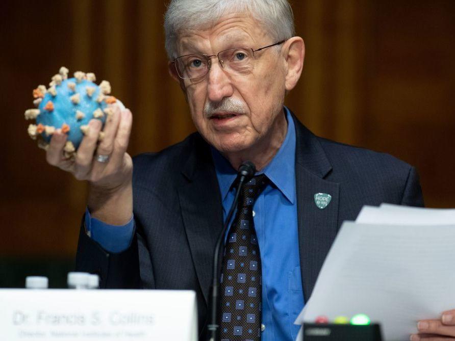 Director of the National Institutes of Health, Dr. Francis Collins, holds a model of the coronavirus. This is the sixth vaccine candidate to join Operation Warp Speed's portfolio, and the largest vaccine deal to date.