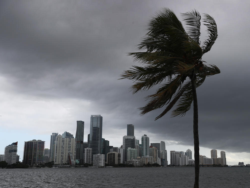 Storm clouds are seen over Miami as Hurricane Isaias approaches the east coast of Florida on Saturday.