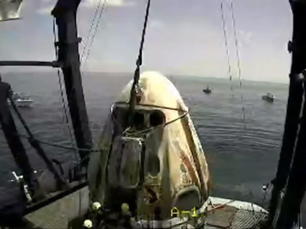 The SpaceX capsule sits aboard a recovery ship in the Gulf of Mexico.
