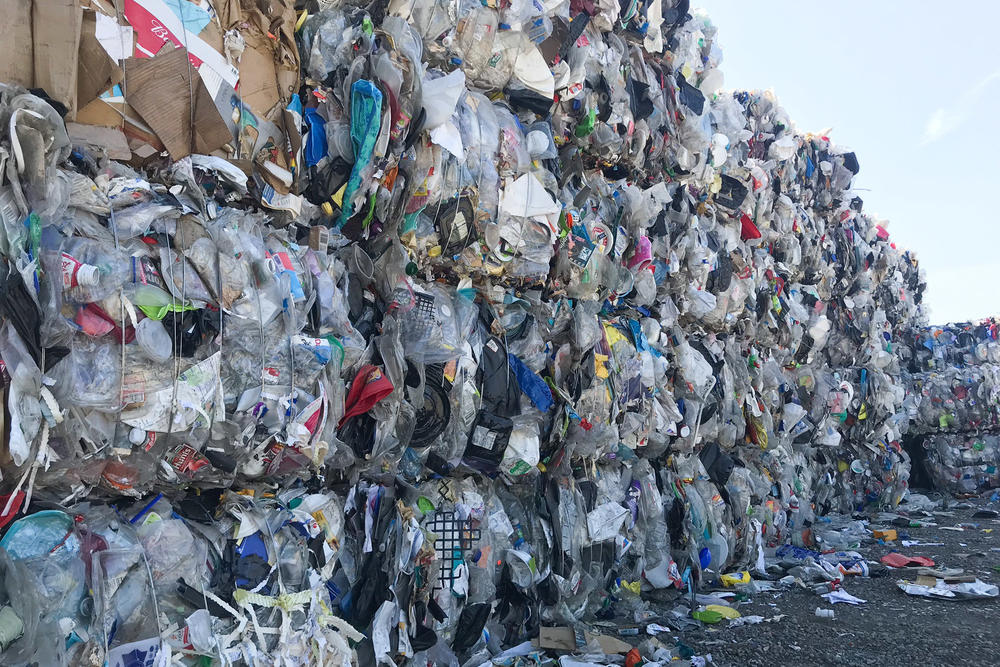 Unwanted used plastic sits outside Garten Services, a recycling facility in Oregon.