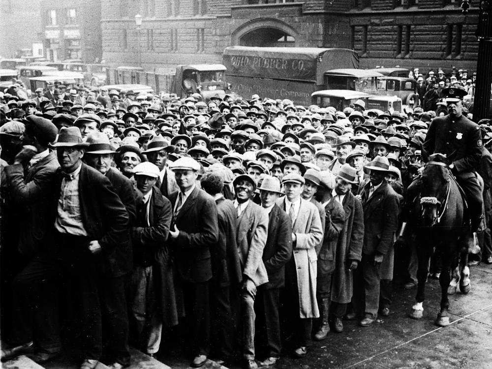 Unemployed people gather outside City Hall in Cleveland, Ohio, on Oct. 9, 1930 during the Great Depression.