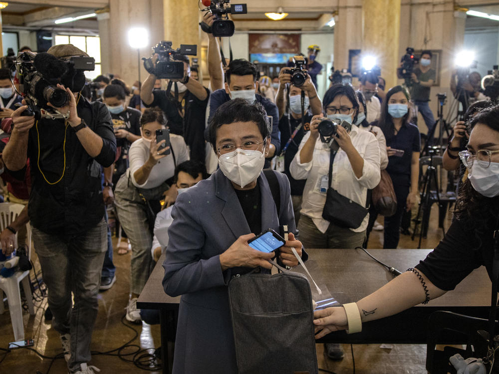 Maria Ressa, CEO of the Rappler news site, leaves a Philippine regional trial court after being convicted for cyber libel on June 15. Ressa, a veteran journalist and outspoken critic of President Rodrigo Duterte, is the focus of <em>A Thousand Cuts, </em>a documentary to be released virtually in the U.S. on Aug. 7.