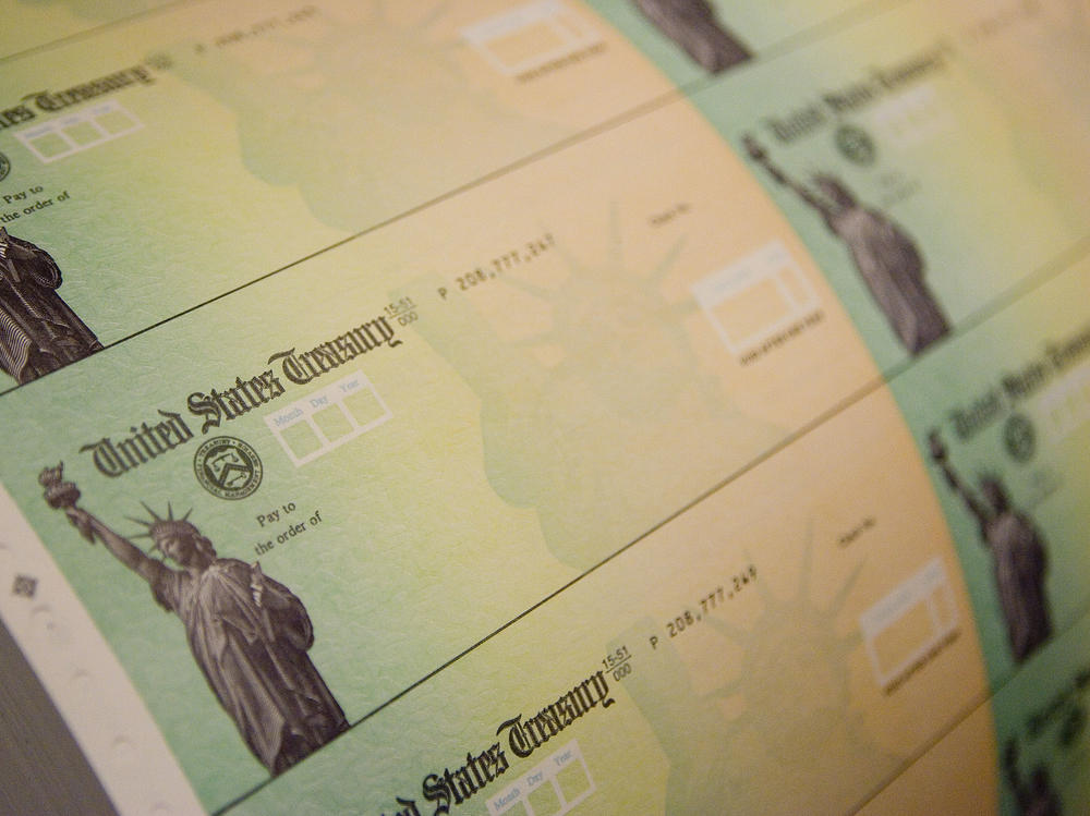 Stimulus checks are prepared on May 8, 2008, in Philadelphia. In 2020, stimulus checks again went to many Americans, this time during the pandemic's economic fallout. Some of that money went to thousands of foreign workers not eligible to receive the funds.