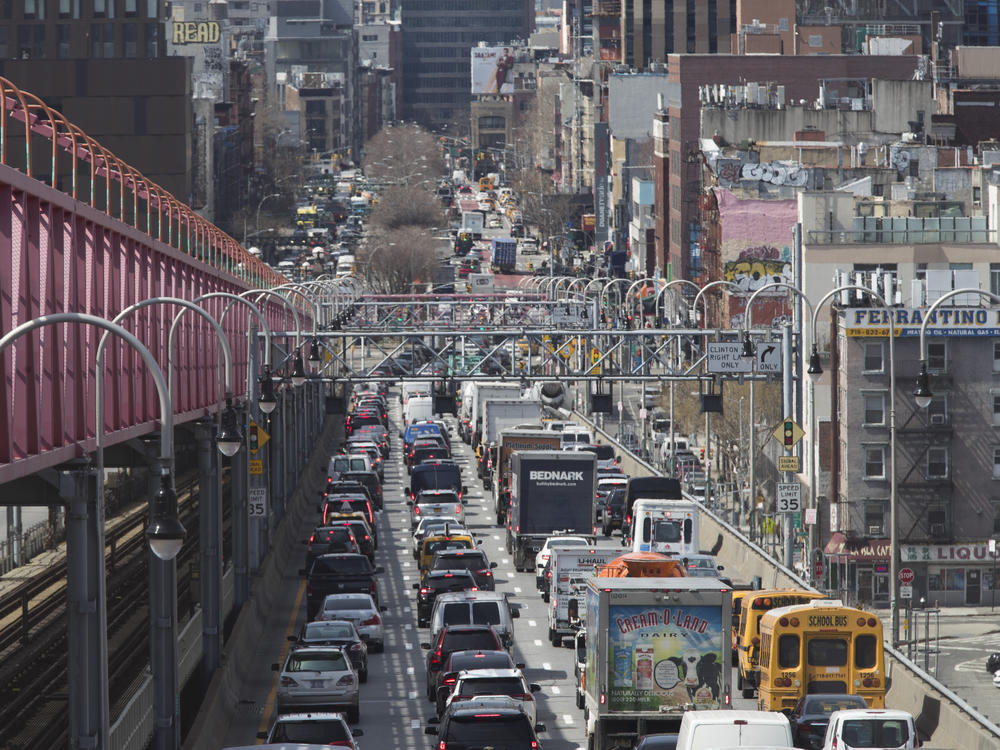 Traffic makes its way into Manhattan over the Williamsburg Bridge in March 2019. New checkpoints at New York City's major bridges, tunnels and other sites are meant to drive home the message that 14-day quarantine rules are mandatory for people returning from states considered coronavirus hot spots.