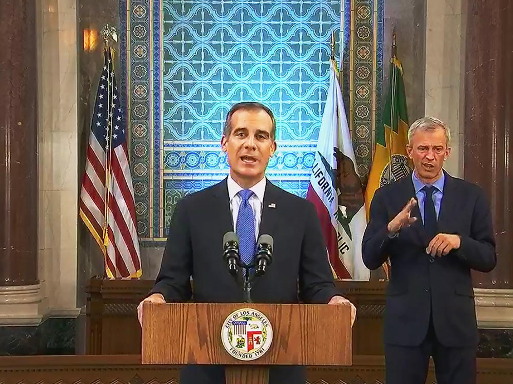 Los Angeles Mayor Eric Garcetti, pictured giving his annual State of the City speech in  April, announced on Wednesday that he is authorizing the Department of Water and Power to shut off service at properties hosting large parties, which are forbidden under coronavirus health orders.