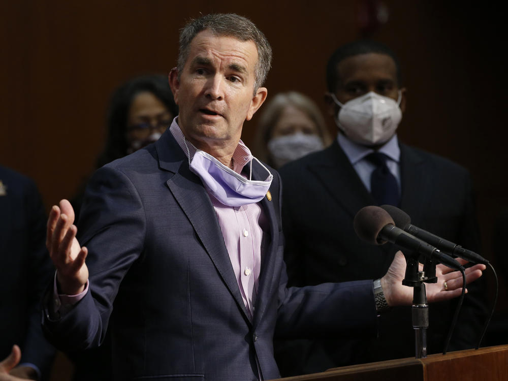 Virginia Gov. Ralph Northam speaks during a news conference in Richmond, Va. on June 4. Virginia has rolled out a smartphone app to automatically notify people if they might have been exposed to the coronavirus.