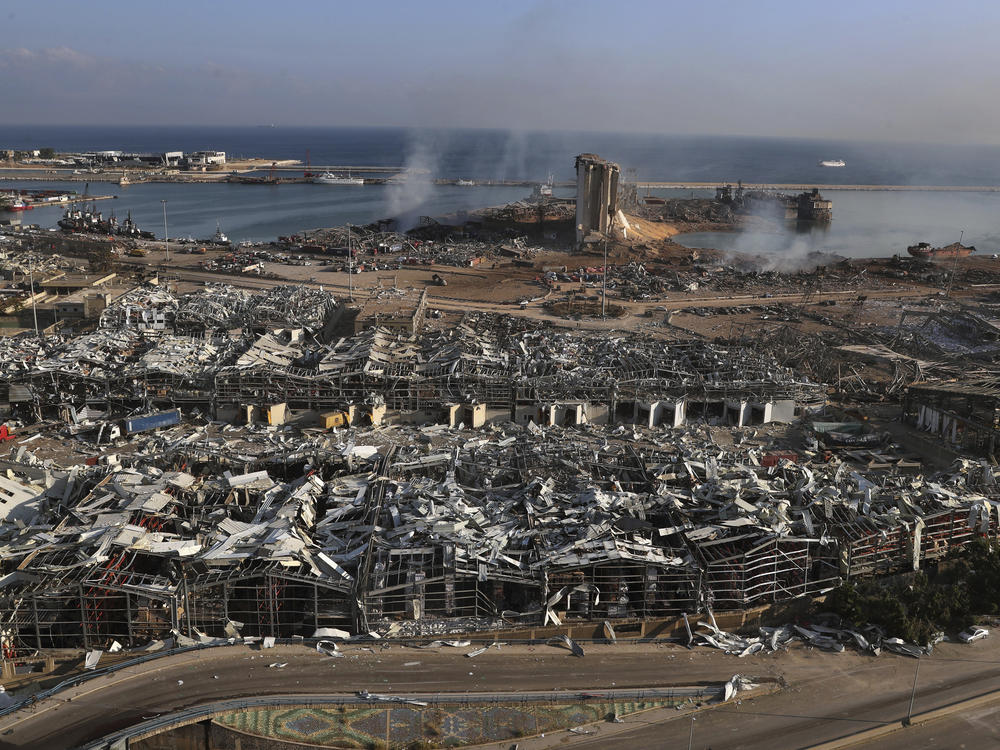 An aerial view of Beirut's port one day after a massive explosion rocked the Lebanese capital. Tuesday's blast flattened much of the port and damaged buildings across the city.