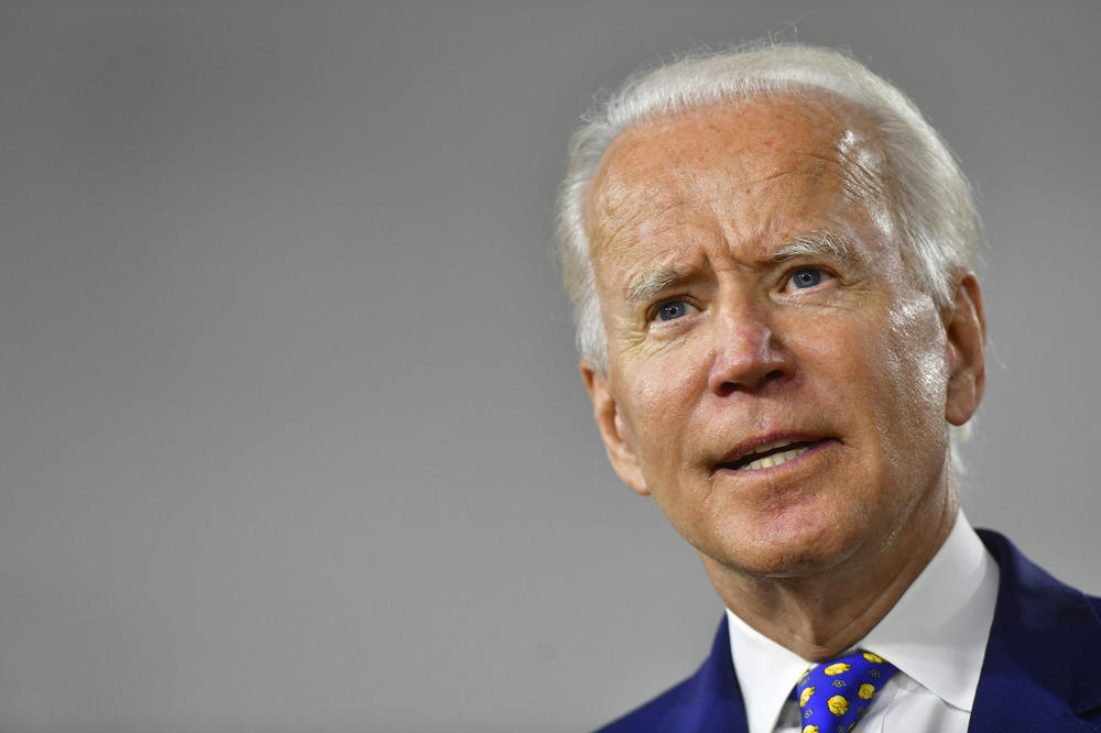 Presumptive Democratic presidential nominee former Vice President Joe Biden delivers a speech in Wilmington, Del., on July 28. The campaign announced Wednesday he would not travel to Milwaukee for the Democratic convention.