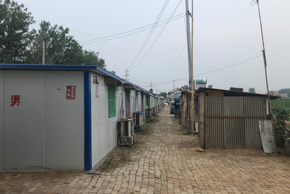 About 40 residents whose houses were demolished in Hongchuancun, or Red Boat Village, now live in these plastic and tin shacks built by the local government.