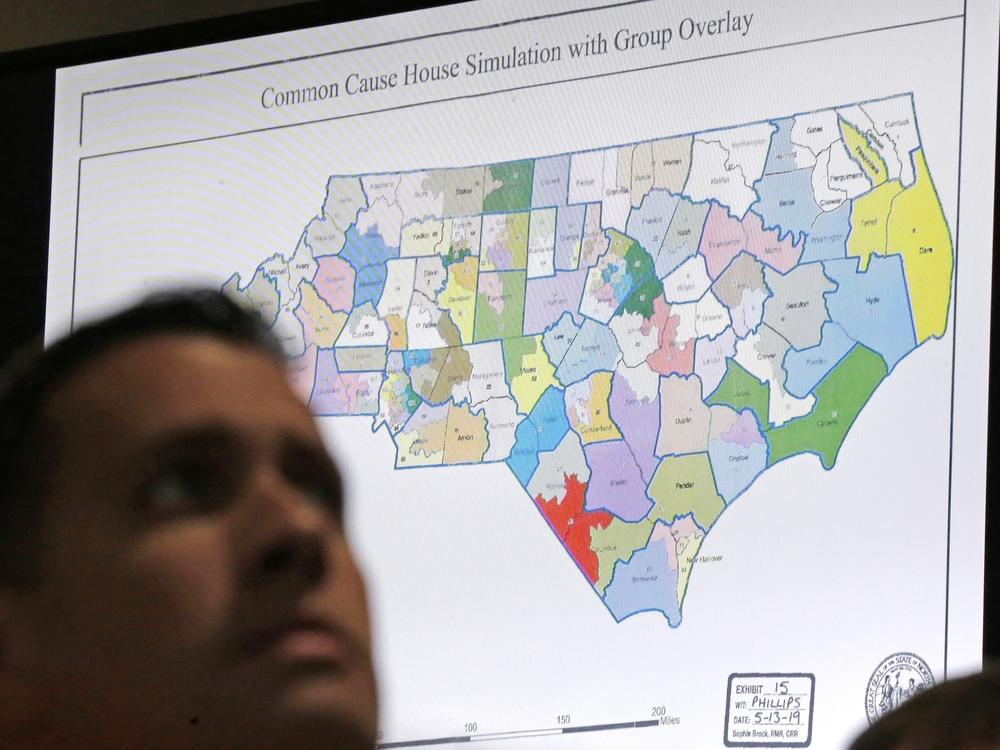 A North Carolina map is shown in Wake County Superior Court during a 2019 redistricting trial. Republicans and Democrats are preparing for a battle of state legislative supremacy that could have a big effect on political power for the next decade.