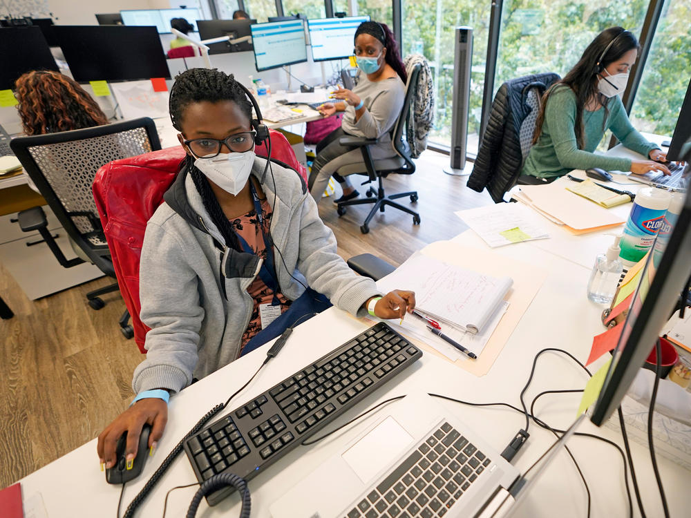 Contact tracers (from left) Christella Uwera, Dishell Freeman and Alejandra Camarillo work at Harris County Public Health Contact Tracing facility in Houston in June.