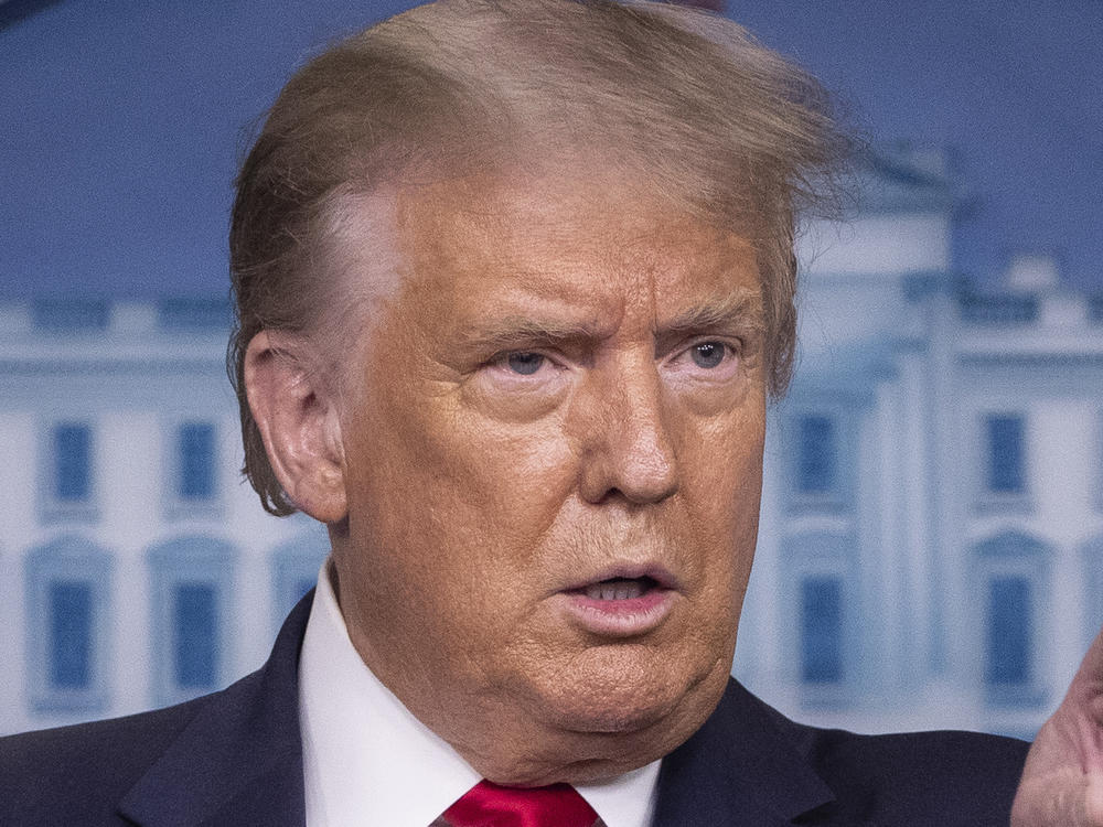 President Trump speaks during a briefing with reporters at the White House on Monday.