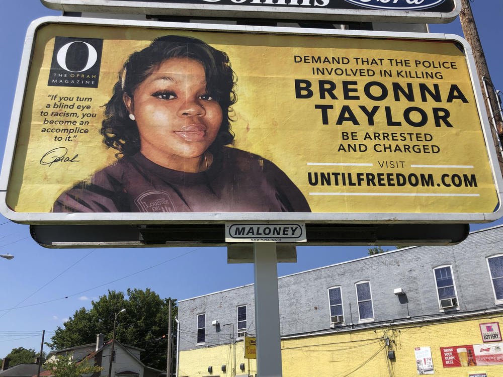 A billboard with a photo of Breonna Taylor, sponsored by <em>O, The Oprah Magazine</em>, is on display on Friday in Louisville, Ky. It's one of 26 billboards going up across the city demanding arrests in her shooting death.