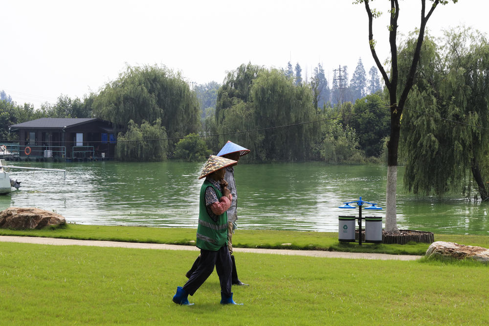 Chao Lake, one of the largest freshwater lakes in the country, sits squarely in Hefei, the capital city of Anhui province. Brigades of local workers and volunteers fortified the rim of the lake with sand bags last month and put up warning signs on the perimeter because of this season's dangerously high water levels.