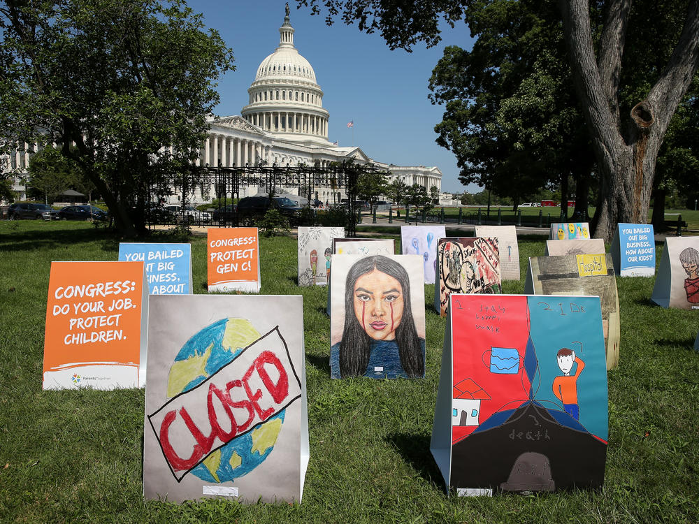 An installation of children's art is set up outside the Capitol on Wednesday. Kids can develop 