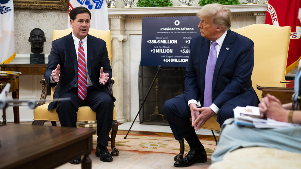 Trump meets with Arizona Gov. Doug Ducey in the White House on Aug. 5. Geovanny is angry about how the state has handled the pandemic. That may be a motivating factor for him this fall, he said.