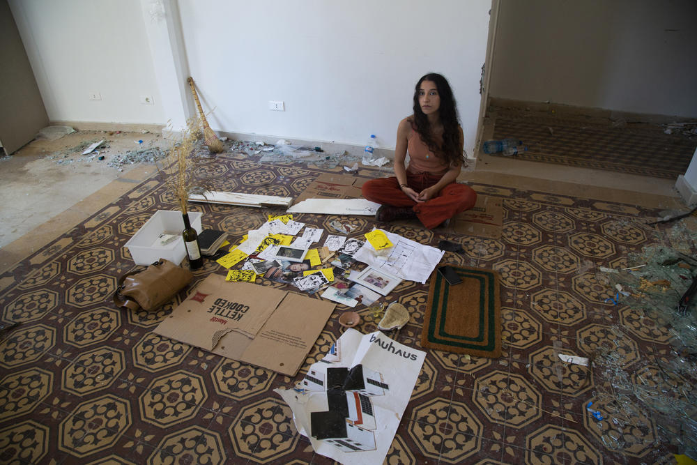 Karen Madi, a resident of the neighborhood of Rue Pasteur who works at a gallery in the Karantina neighborhood. Her family emigrated but she chose to stay in Lebanon to build her own home and future.