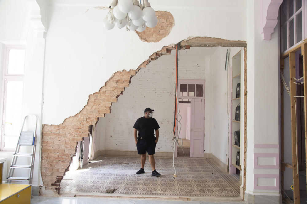 Eli Rezkallah, owner and founder of Plastik Studios, walks around his office in the neighborhood of Gemmayzeh. 