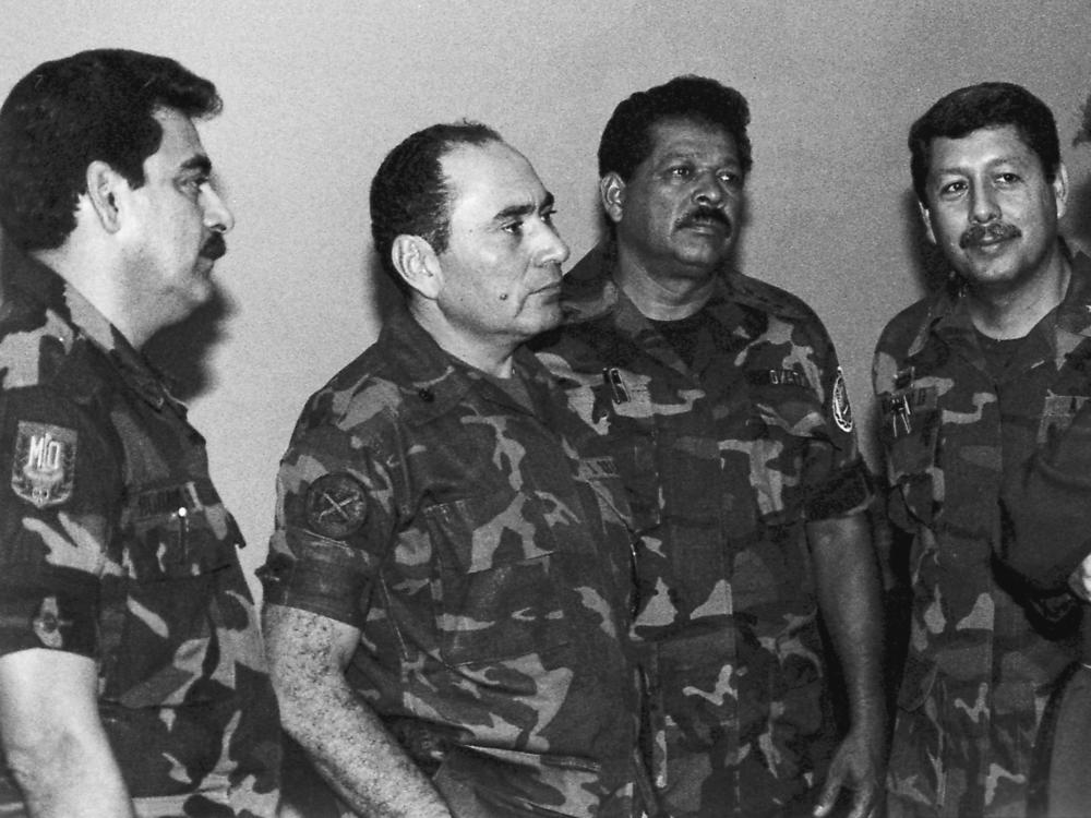 This July 1989 photo shows from left: Col. Rene Emilio Ponce, then head of the Salvadoran armed forces joint chiefs of staff, Rafael Humberto Larios, then defense minister, Col. Inocente Orlando Montano, then public security vice minister, and Col. Juan Orlando Zepeda, then defense vice minister, in an undisclosed location in El Salvador.