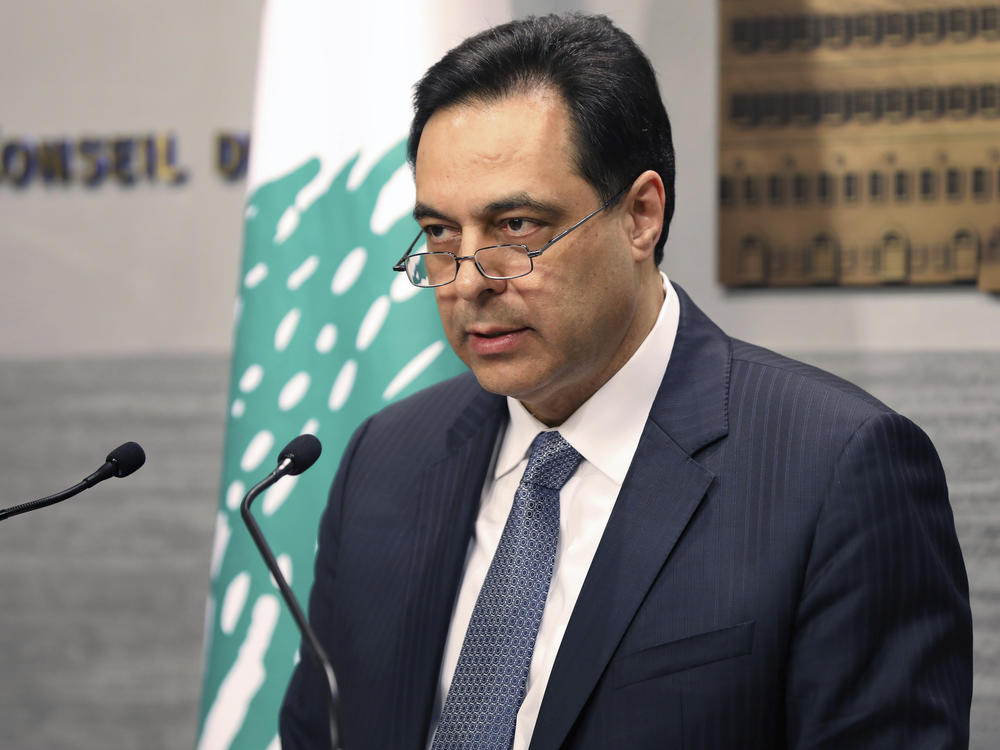Former Lebanese Prime Minister Hassan Diab gives a speech in Beirut in March. Diab announced his resignation days after a disastrous explosion rocked Beirut.