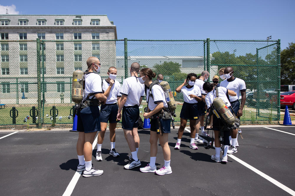 Midshipmen participate in fire safety training on campus in Annapolis.