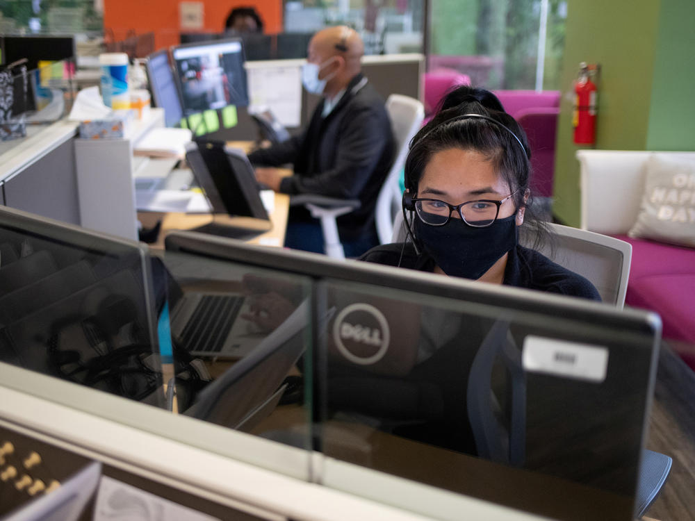 Harris County Public Health contact tracers are seen at work as they try to help stop the spread of the coronavirus outbreak in Houston, Texas, on July 22.