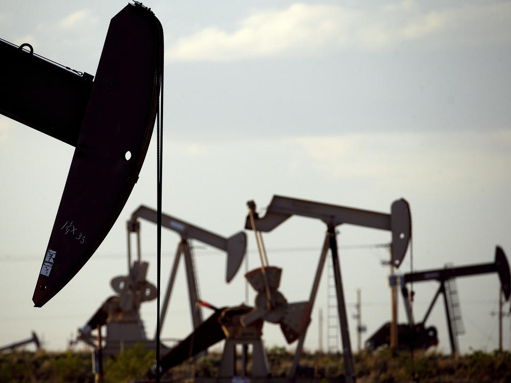 Pump jacks work in a field near Lovington, N.M., in 2015. The Trump administration is lifting an Obama-era rule aimed at limiting emissions of methane, a potent climate-warming gas.