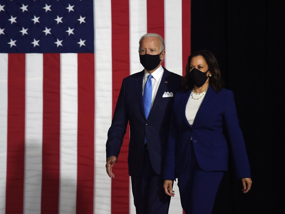 Presumptive Democratic presidential nominee Joe Biden and his vice presidential running mate, Sen. Kamala Harris, arrive to conduct their first appearance together in Wilmington, Del., on Wednesday.