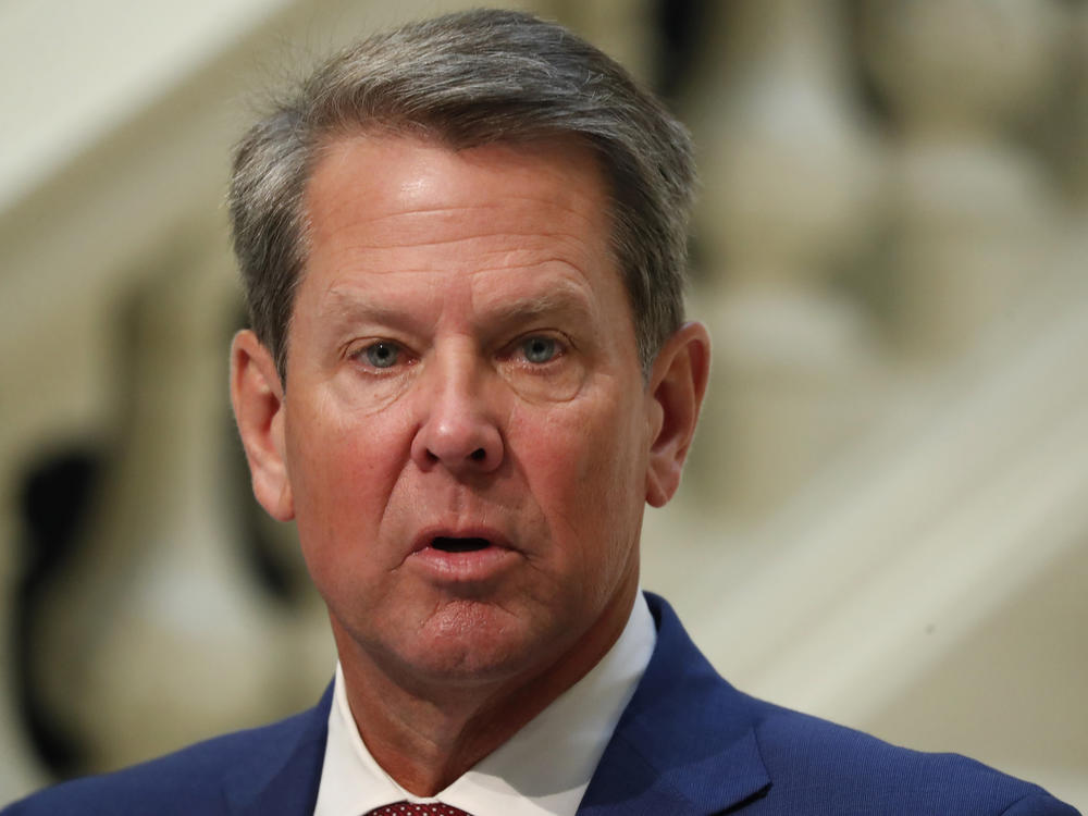 Georgia Gov. Brian Kemp, pictured last month, withdrew litigation against Atlanta Mayor Keisha Lance Bottoms and the City Council over a  requirement to wear masks in public and other restrictions related to the COVID-19 pandemic.