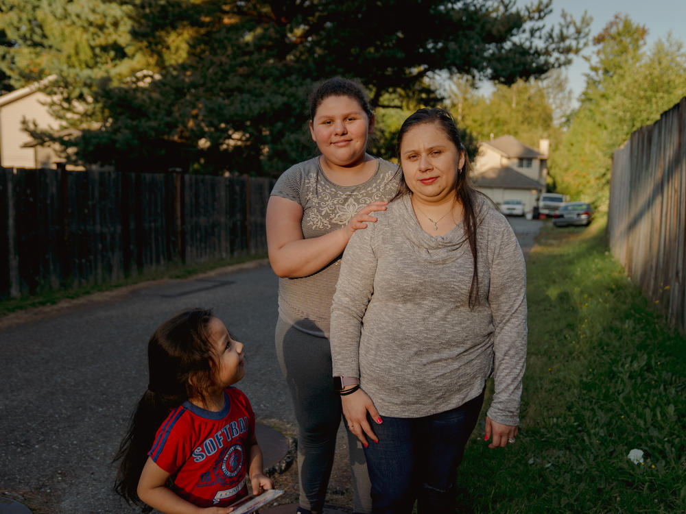 Patricia Lopez, right, with her daughter, Yamely Alfaro Lopez, 11, and son, Kevin Alfaro Lopez, 3, in Everett, Wash.