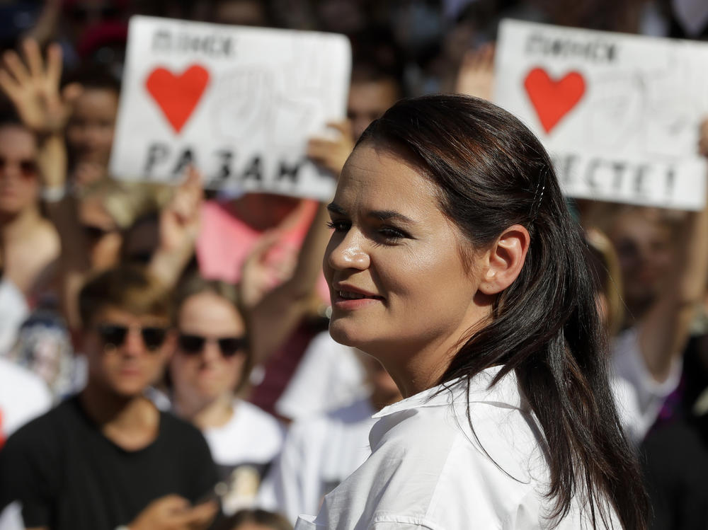 Svetlana Tikhanovskaya, candidate for Belarus' presidential election, smiles as she speaks to people during a meeting in her support in Brest, Belarus, on Aug. 2.