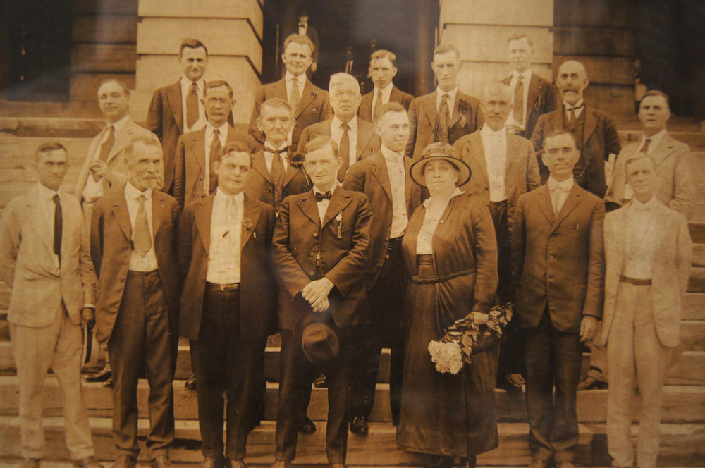 Tennessee state Rep. Harry T. Burn (center, second row from front, smiling) poses with suffrage activist Harriet Taylor Upton and all of Tennessee's Republican state legislators who voted for the amendment.