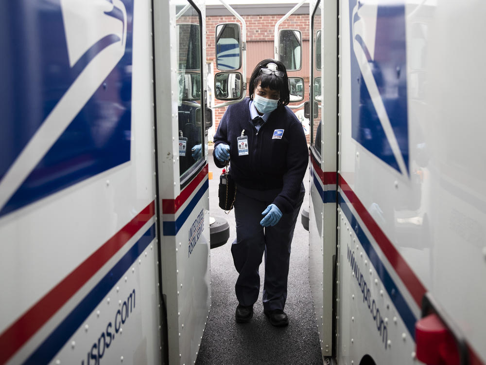 United States Postal Service carrier Henrietta Dixon gets into her truck to deliver mail in Philadelphia on May 6.