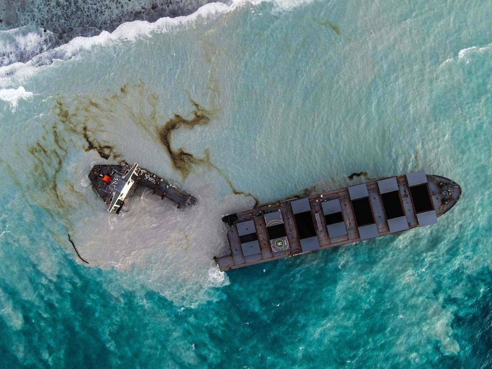 An aerial picture taken on Sunday shows the MV Wakashio bulk carrier that had run aground and broke into two parts near Blue Bay Marine Park, Mauritius.