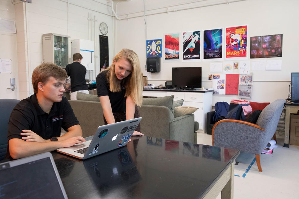 The lab boasts amenities like video games and a "snack zone" to help students through their long hours in the lab.