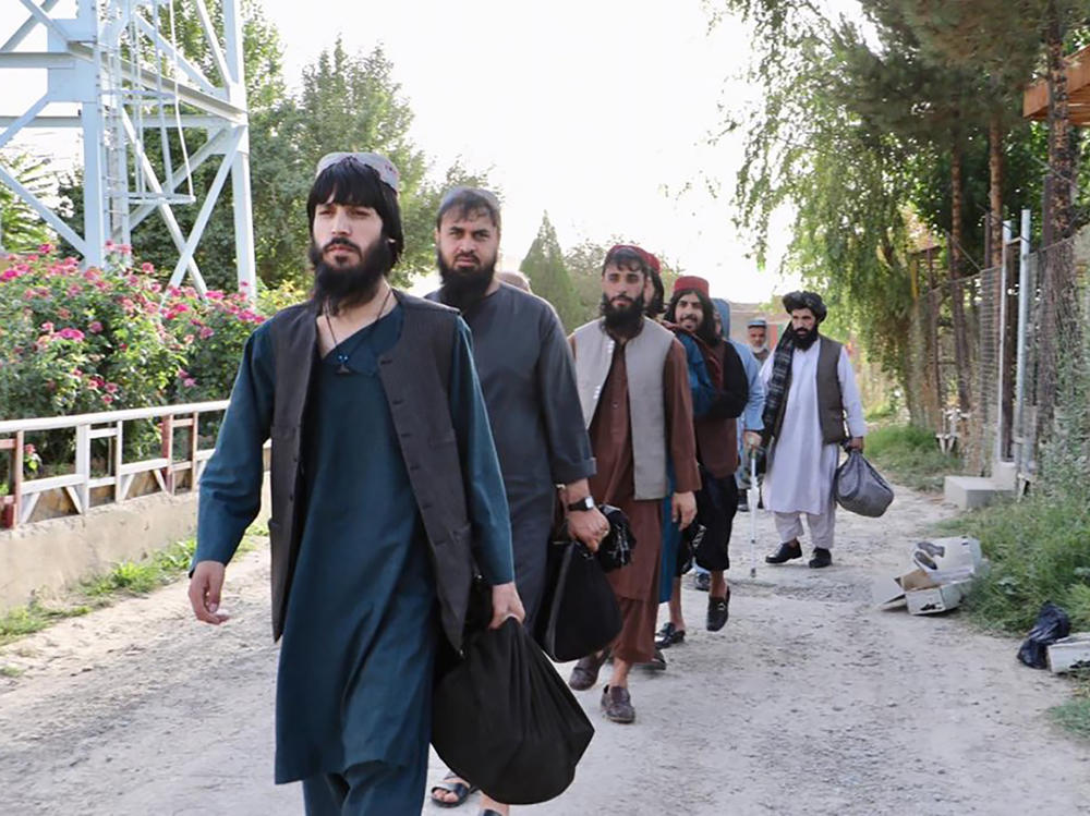 Taliban prisoners are released from Pul-e-Charkhi jail in Kabul, Afghanistan, on Aug. 13. The government is releasing Taliban prisoners to pave the way for negotiations between the warring sides in Afghanistan's protracted conflict.