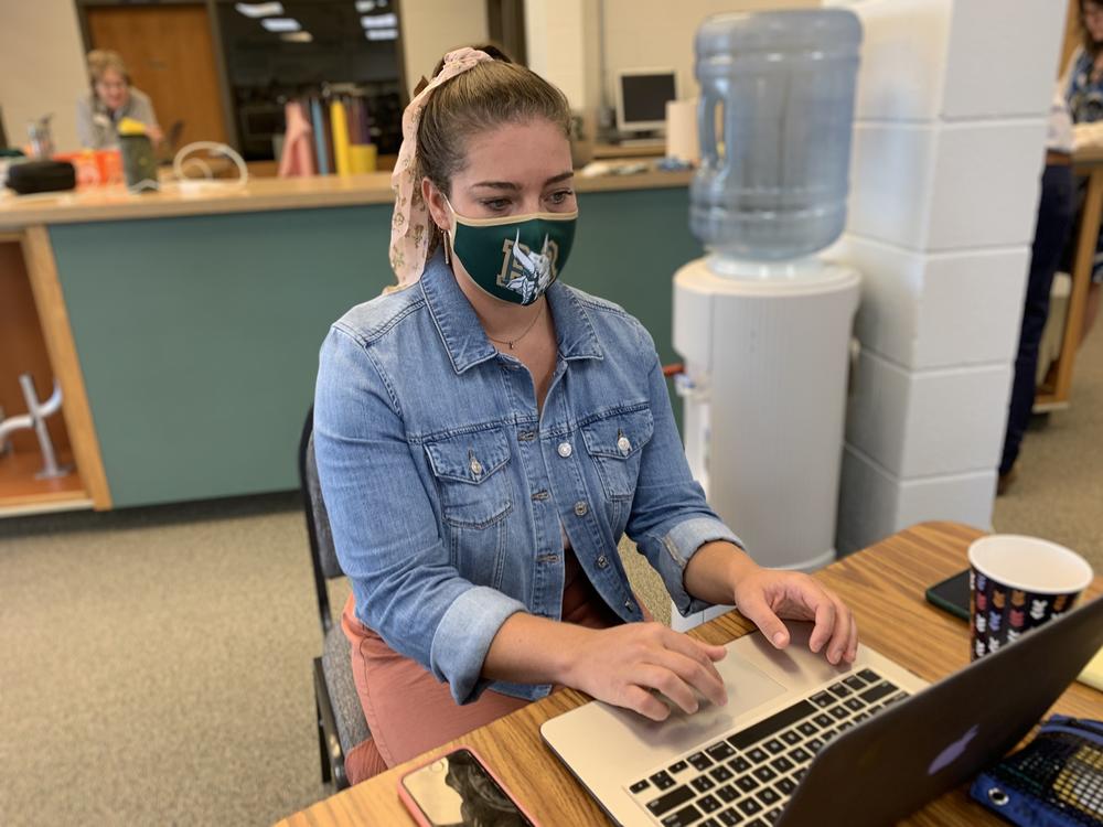 Third grade teacher Maya Davis attends training before her school district reopens.