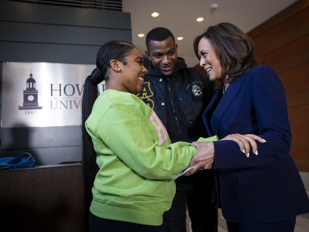 Sen. Kamala Harris visits the Washington, D.C., campus of her alma mater, Howard University, on the day she launched her presidential campaign in January 2019. She's seen speaking to Mara Peoples, executive vice president of the Howard University Student Association, and Amos Jackson III, the executive president.