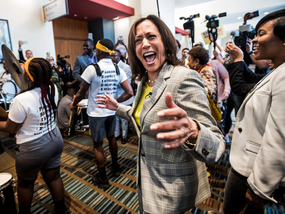 Sen. Kamala Harris dances with a marching band upon arrival at the South Carolina Democratic Party Convention in June 2019, when she was a presidential candidate in the Democratic primary race.