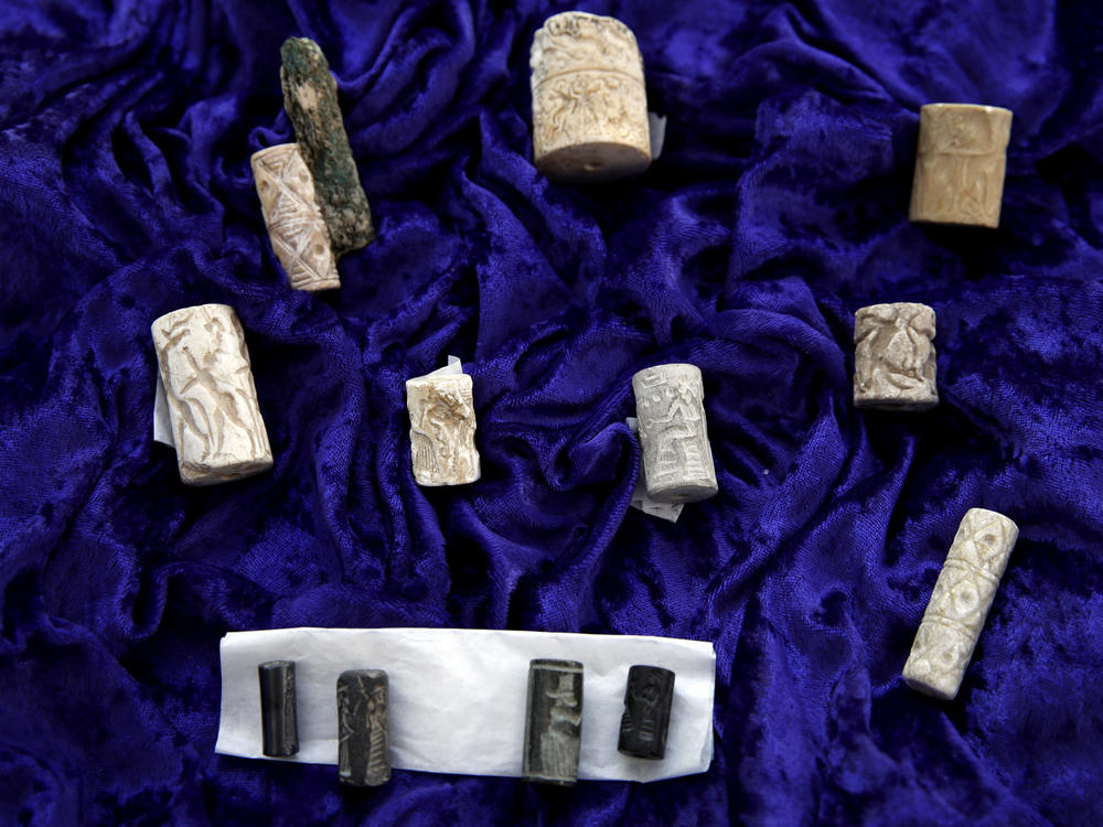 Ancient cylinder seals from Iraq were among the objects returned by U.S. Immigration and Customs Enforcement, after being smuggled into the United States in violation of federal law.