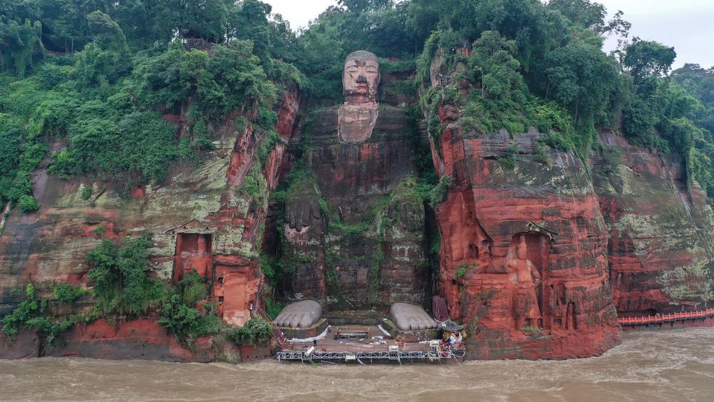 An aerial photo shows the Leshan Giant Buddha surrounded by floodwaters following heavy rains in Leshan in China's southwestern Sichuan province on Wednesday.