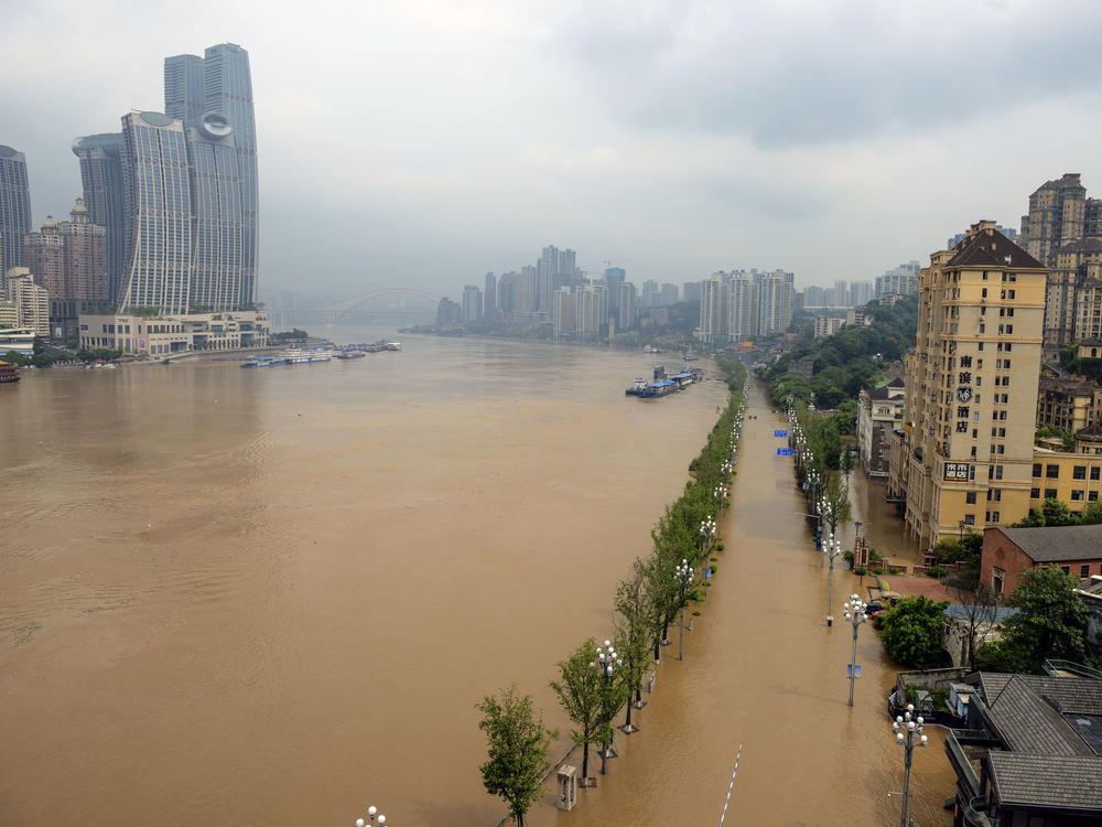 A main road in China, is shown inundated with flood waters, on Wednesday.