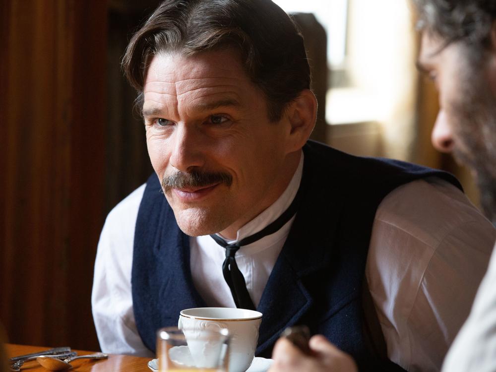 Ethan Hawke plays Serbian American inventor Nikola Tesla in the playful new biopic, <em>Tesla</em>.