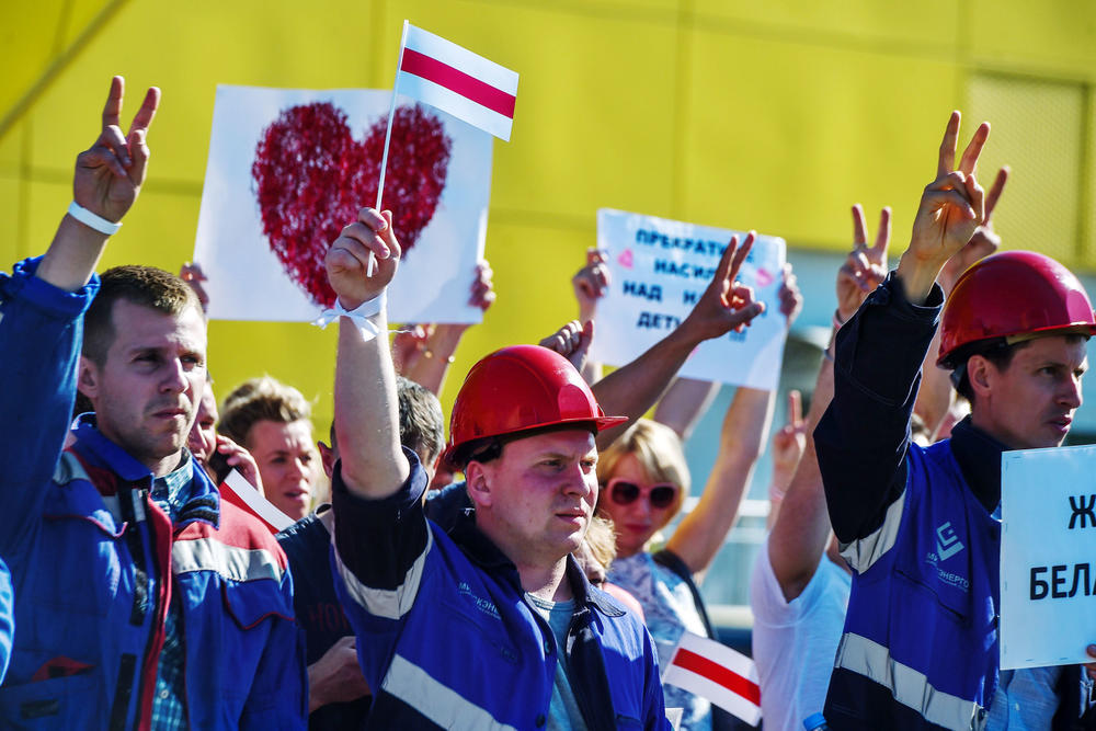 Employees of the Minsk Energy Company protest on Aug. 17. Thousands of factory workers went on strike earlier this week but have since come under pressure and threats of job loss.