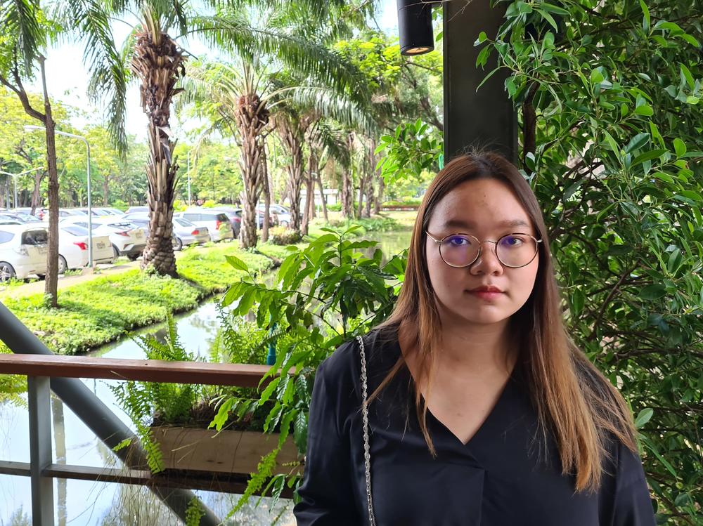 Panusaya Sithijirawattanakul, who read a politically charged manifesto at a rally last week, outside Thammasat University on Tuesday.